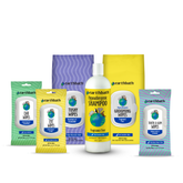 Collection of Earthbath pet care products including shampoo, wipes, and bags on a white background.