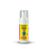 Earthbath grooming foam bottle with yellow label on a white background