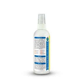White spray bottle with a label on a white background