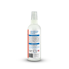 White spray bottle with a label on a white background