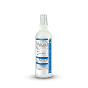 White spray bottle with a label on a white background