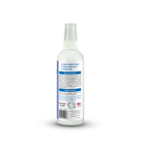 White spray bottle with a label on a white background