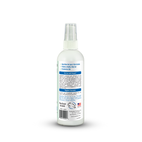 White spray bottle with label on a white background
