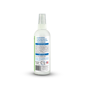 White spray bottle with label on a white background