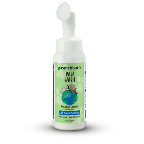 Bottle of Earthbath Paw Wash with a brush on a white background