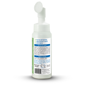 White bottle with a pump on a white background