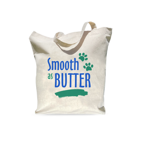 A beige reusable shopping bag with the text 'Smooth as Butter' printed on the front.